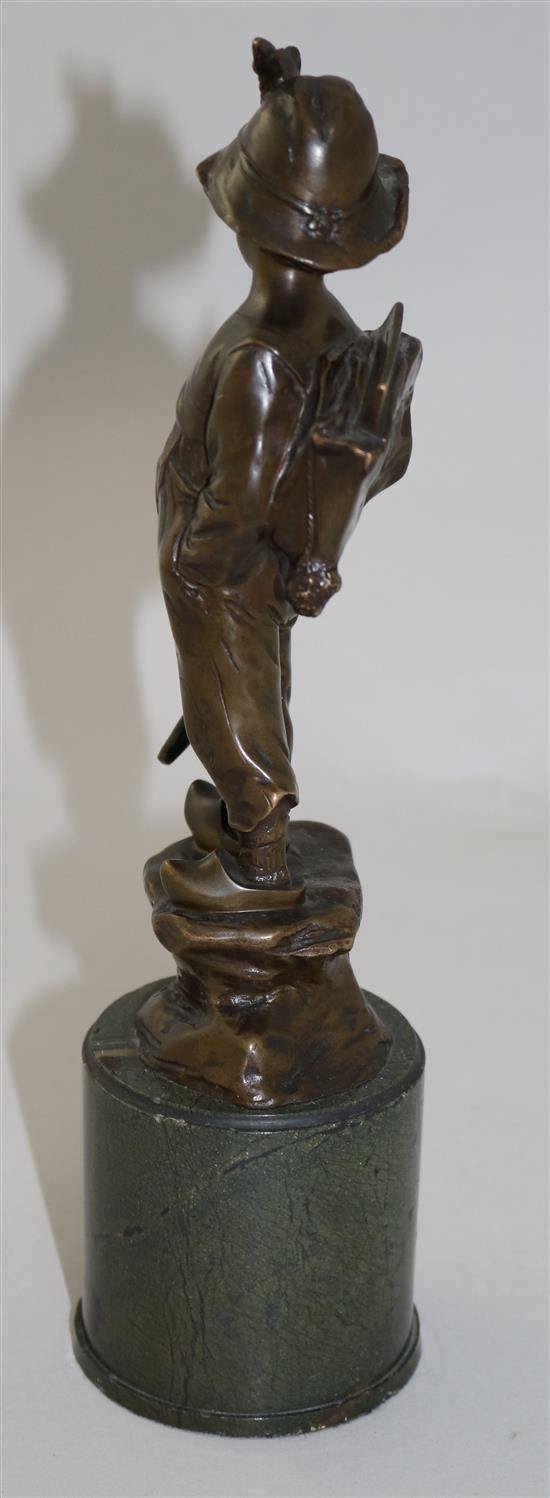 Paul Ludwig Kowalczewski (German, 1865-1910). A bronze figure of a boy wearing a backpack, overall H.11in.